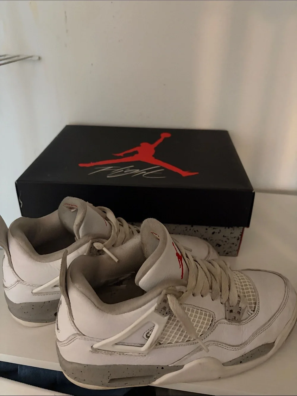 Jordan White and Gray Retro Basketball Sneakers with Red Jumpman
